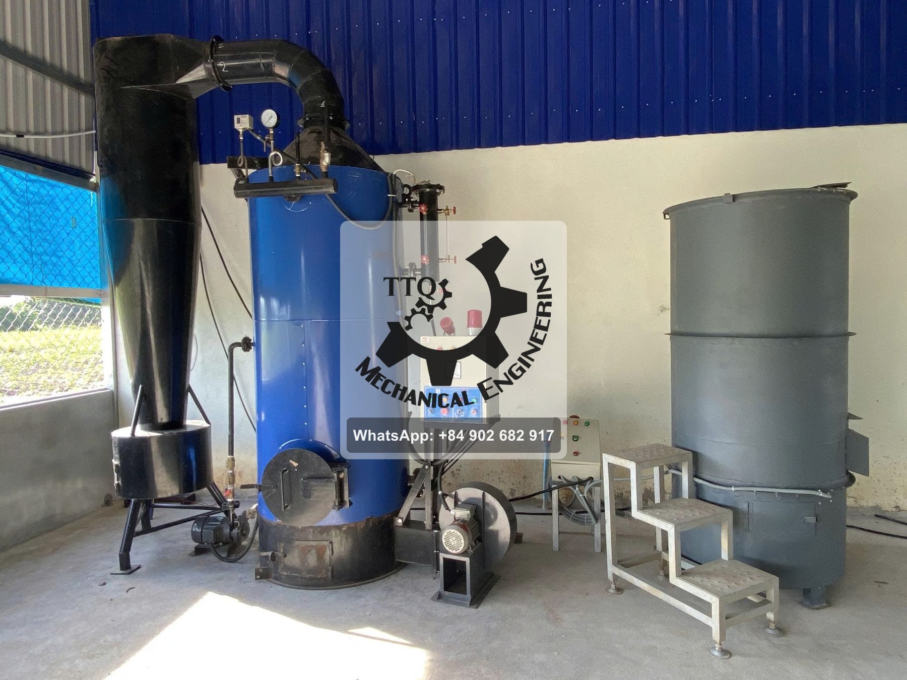 Installed vertical biomass steam boiler with cyclone, pressure gauge, sight glass and control panel